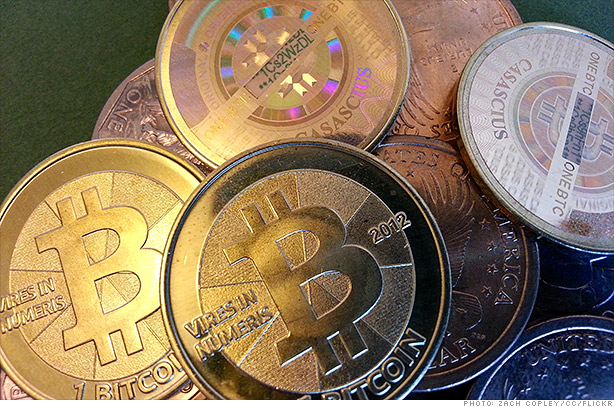 pile of gold and silver bitcoins