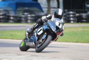 Swinging through Turn Five at Blackhawk Farms with my green rear wheel and new Bell Helmet. 