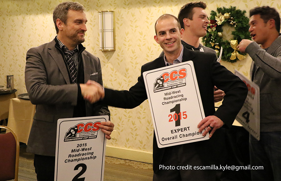 Bart Brejcha passing off the #1 plate to Drew Jankord