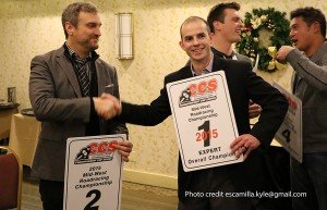 Bart Brejcha passing off the #1 plate to Drew Jankord