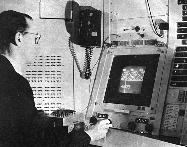 Ivan Southerland of Evans & Southerland using an early computer