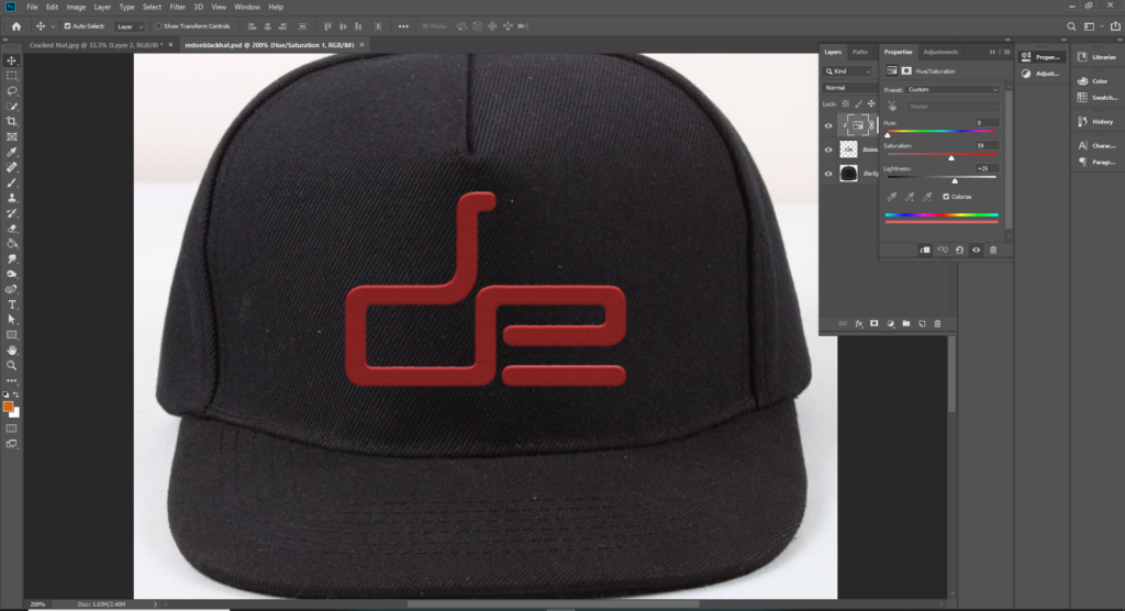 A screen shot of a hat with the DE logo on it for Photoshop Level 2